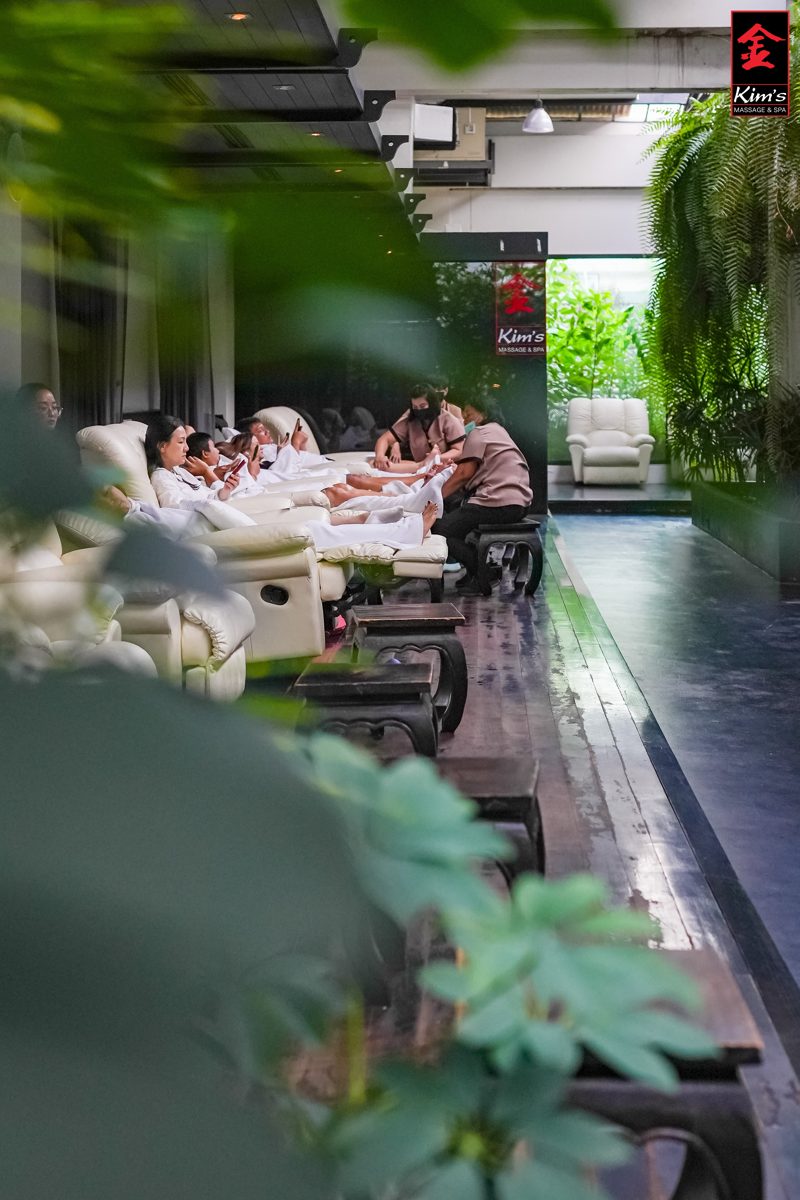 Guests enjoying foot massages in Kim’s lounge