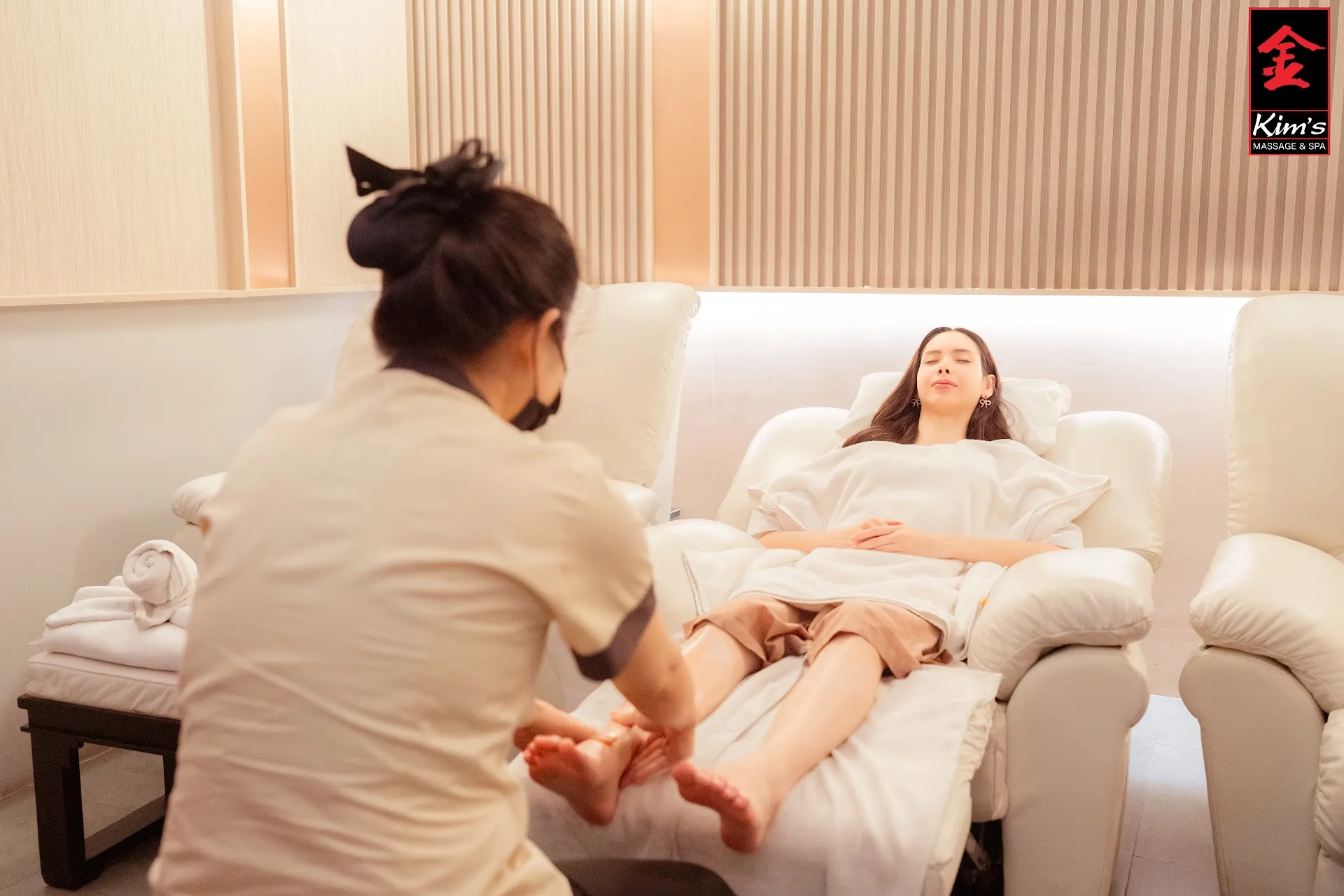 Therapist giving a foot massage