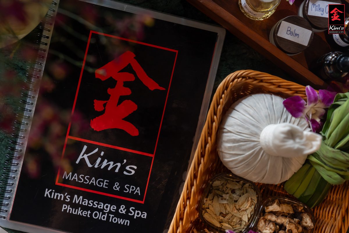 Herbal compress beside the Kim’s Massage & Spa menu